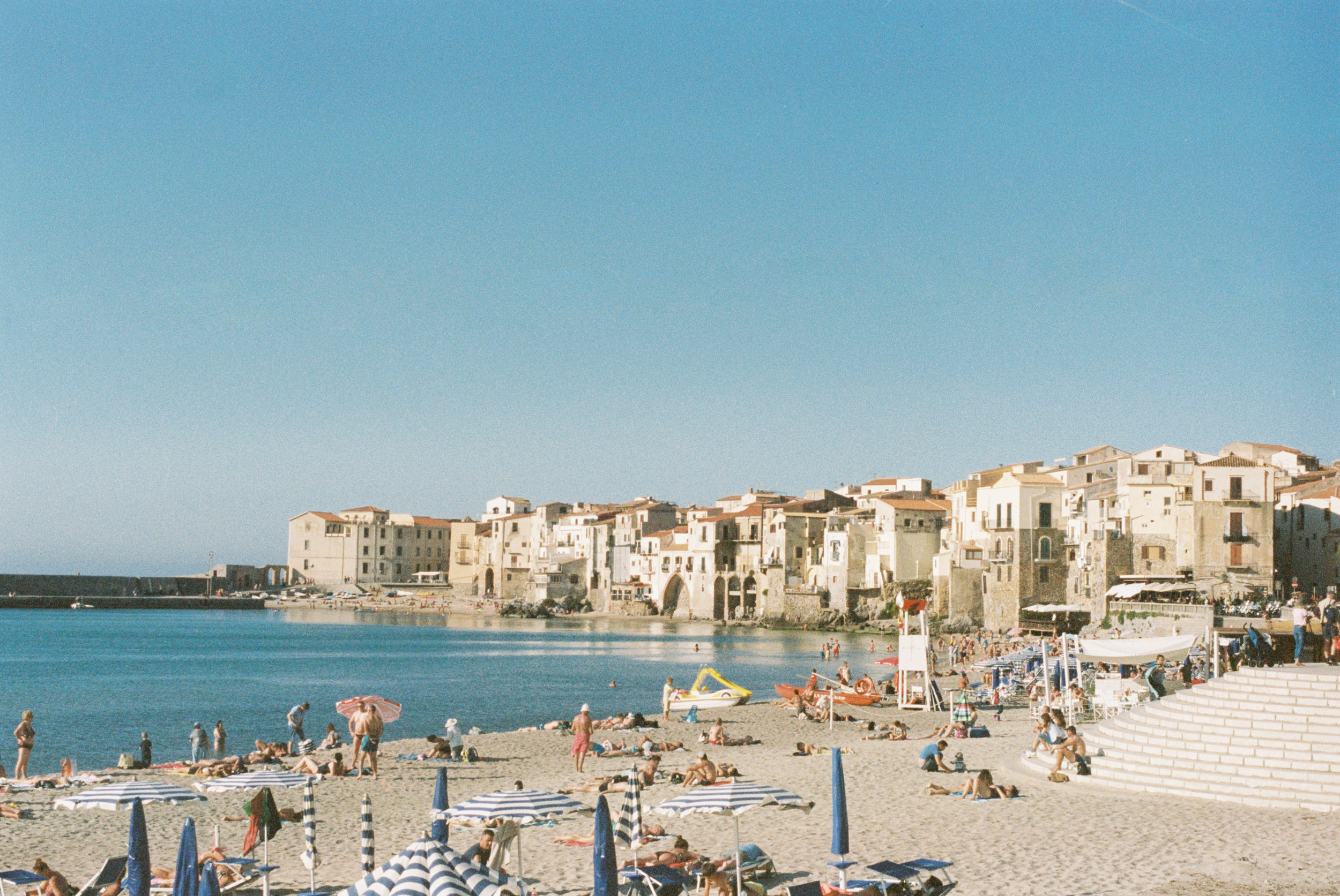summer vacation by the sea in cefalu, sicily